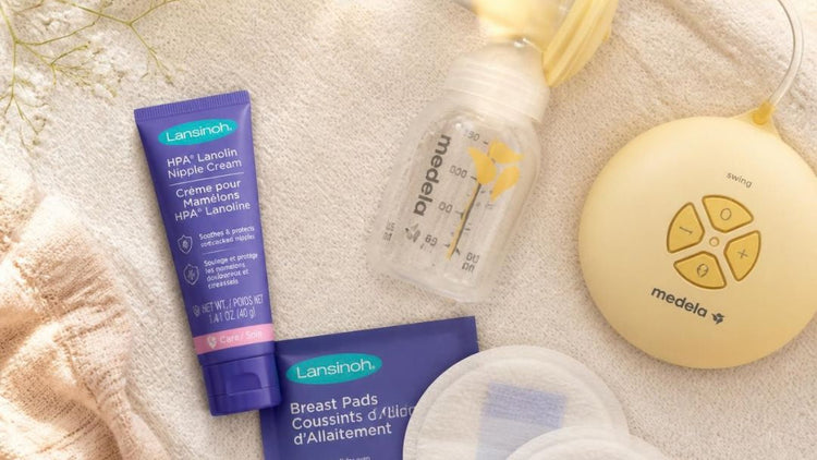 Breastfeeding essentials including Lansinoh nipple cream, breast pads and Medela breast pump