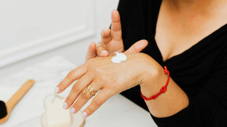Winter hand and nail care with moisturising cream for dry, cracked skin.