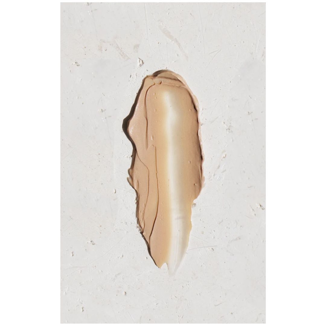Airyday Mineral Mousse SPF50+ Dreamscreen smear on marble countertop