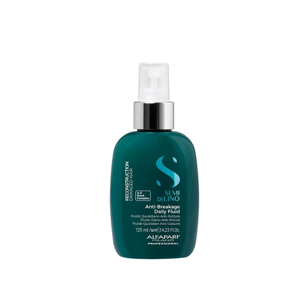 A bottle of Alfaparf Semi Di lino Anti-Breakage Daily Fluid hair care product in a dark teal-green color with a silver pump and white cap, on a plain white background.
