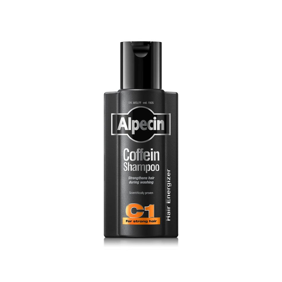 Alpecin Caffein Shampoo bottle in black with white and orange text, shown on a clean white background.