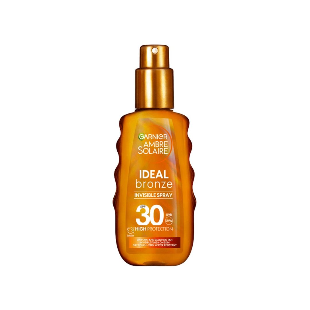 Garnier Ambre Solaire Ideal Bronze Invisible Spray bottle on a white background