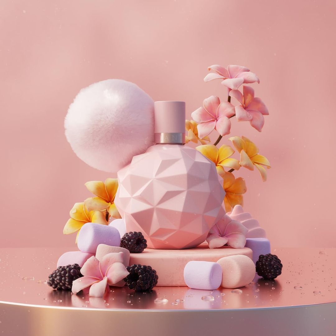 Ariana Grande Sweet Like Candy Eau de Parfum 50ml on a floral pink background