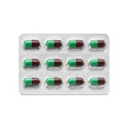 a photo of 12 brown and green capsules