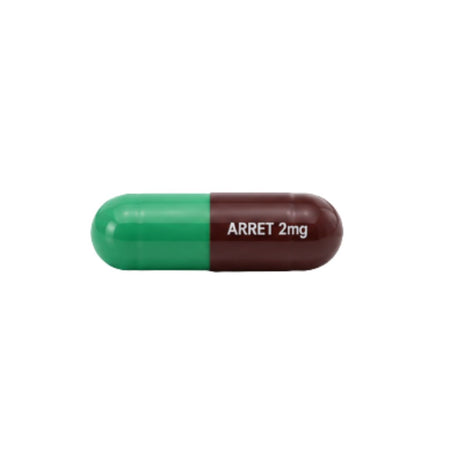 A green and dark brown capsule pill with white text reading 'ARRET 2mg' on a plain white background.