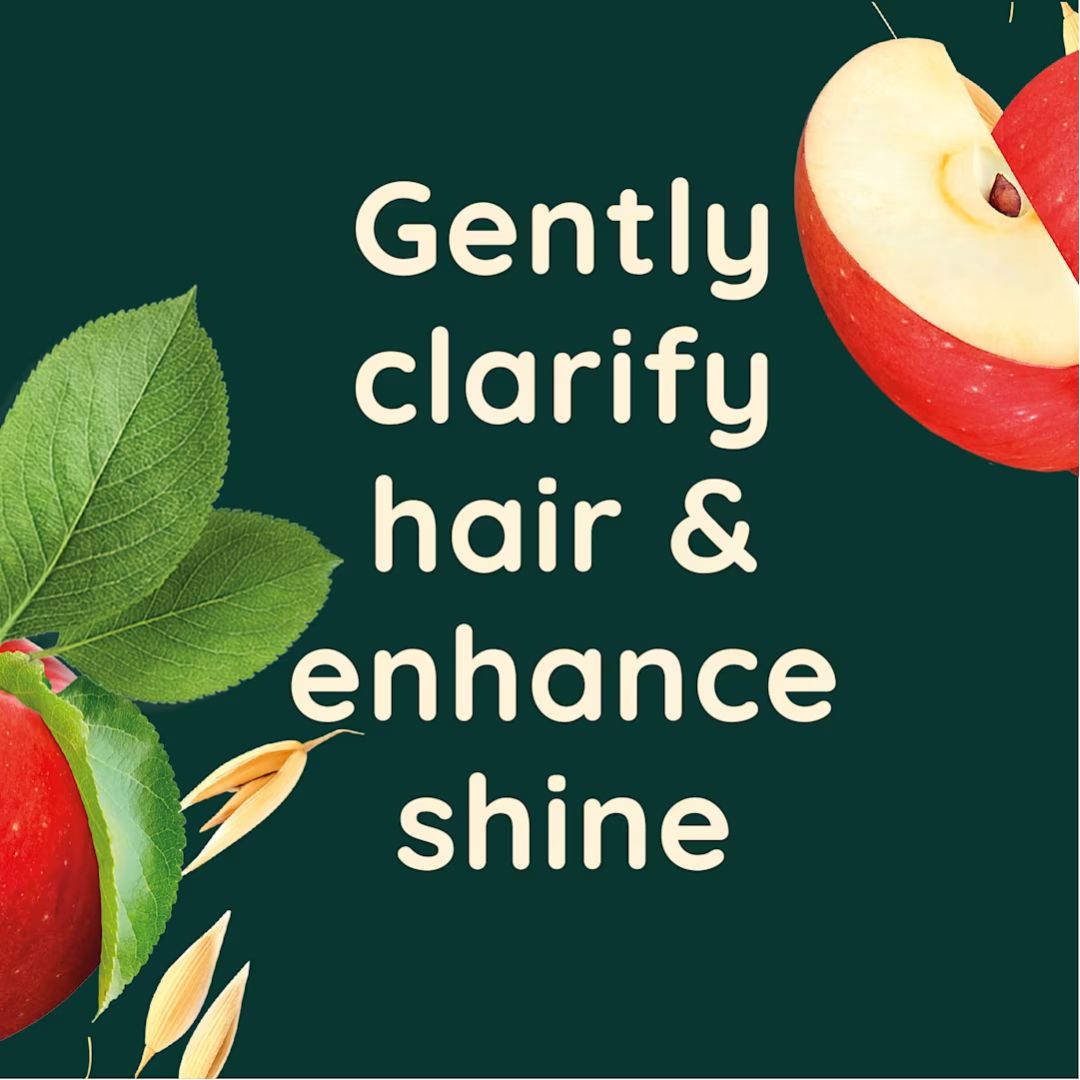Promotional graphic with apples and leaves on a green background, featuring text about hair care.