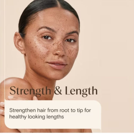 A close-up of a woman with dark hair pulled back, shown against a warm beige background with text reading 'Strength & Length' and 'Strengthen hair from root to tip for healthy looking lengths.'.
