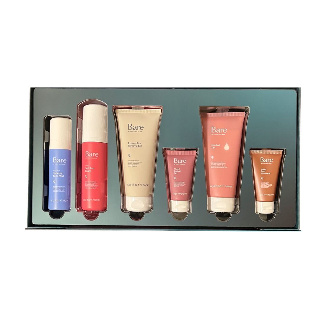 Bare by Vogue Ultimate Glow Ritual Gift Set contents on a white background