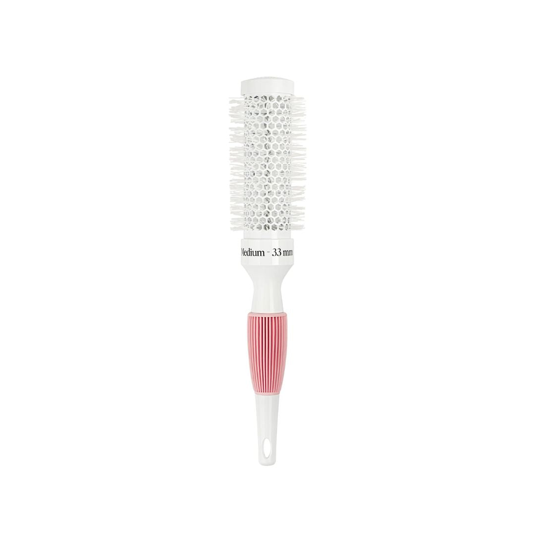 A medium-sized round hairbrush with white bristles, a white plastic handle, and a textured pink grip section, shown against a plain white background.