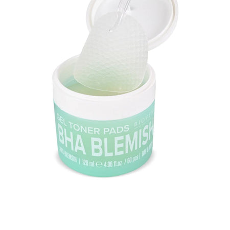 A jar of BHA Blemish Gel Toner Pads with the lid open, showing a translucent, textured gel pad being lifted out. The product is in a white jar with a mint green label.