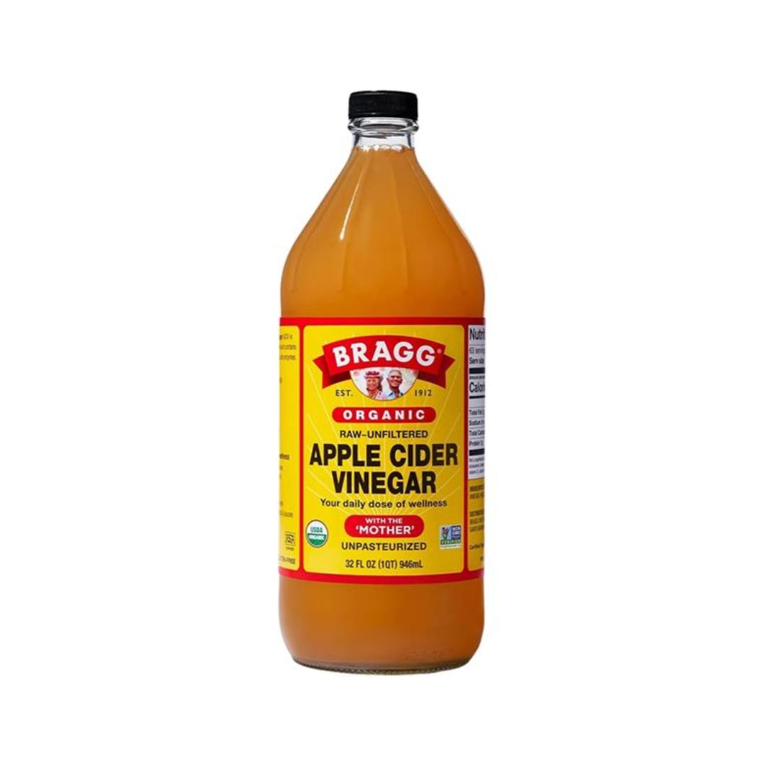 Bragg Apple Cider Vinegar Bottle on a white background