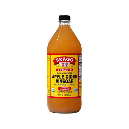 Bragg Apple Cider Vinegar Bottle on a white background