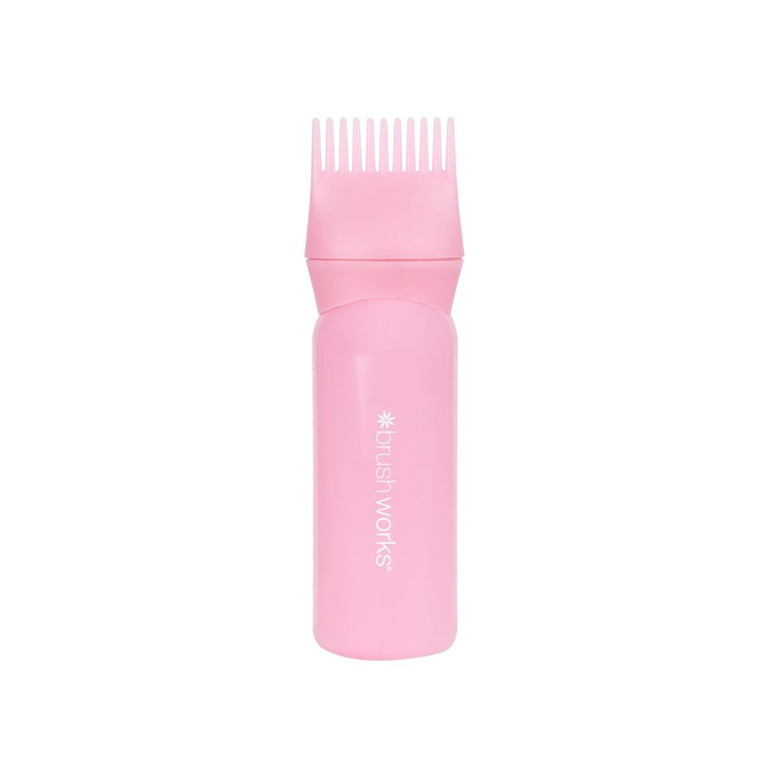 A pink hair extension brush with a comb attachment, featuring the 'brushworks' brand name printed vertically on the handle, set against a plain white background.