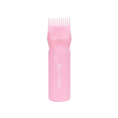 A pink hair extension brush with a comb attachment, featuring the 'brushworks' brand name printed vertically on the handle, set against a plain white background.