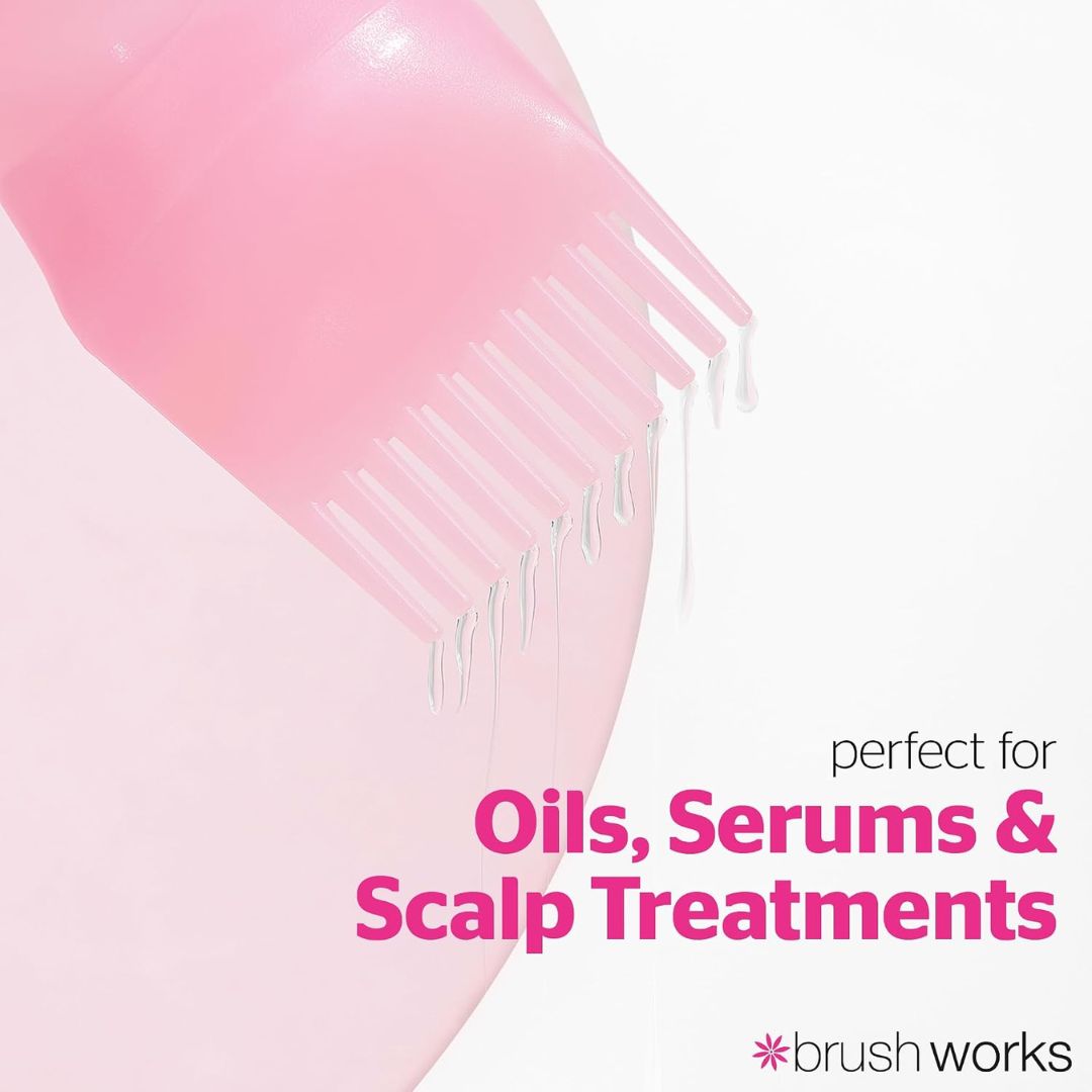 A close-up of a pink applicator brush with fine bristles, shown dripping clear liquid on a white background. Text on the image reads 'perfect for Oils, Serums & Scalp Treatments' with the brand name '*brush works' at the bottom right.
