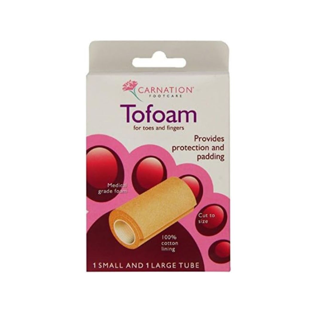 Carnation Tofoam foot care packaging showing a beige cotton bandage illustration on a white and pink card, labeled for toes and fingers.