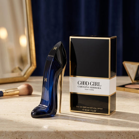 Carolina Herrera Good Girl Eau de Parfum 30ml on a marble countertop with vanity mirror background