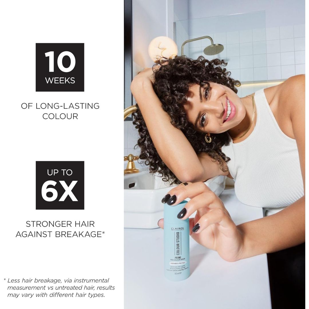 A woman with long, curly dark hair leans over a bathroom counter while holding a light blue bottle of Clésses ColorLash Conditioner. The left side of the image features text highlighting product benefits: '10 WEEKS OF LONG-LASTING COLOUR' and 'UP TO 6X STRONGER HAIR AGAINST BREAKAGE'.