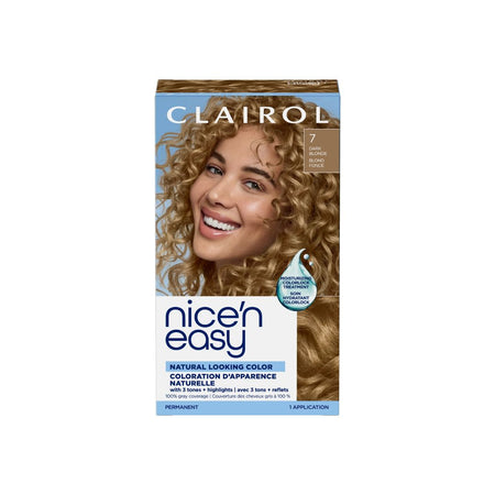 Clairol Nice and Easy hair dye box in shade 7, featuring a smiling woman with curly light brown hair on the packaging, set against a plain white background.