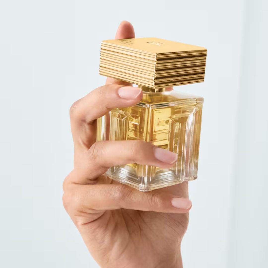 Destin de Balmain Paris Eau de Parfum being held in a hand