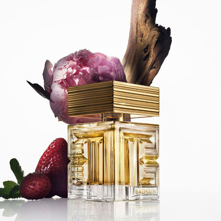 Perfume bottle with decorative elements on a white background