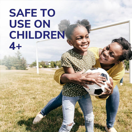 Woman and child playing with a soccer ball on a grassy field, with text indicating safety for children aged 4 and up.