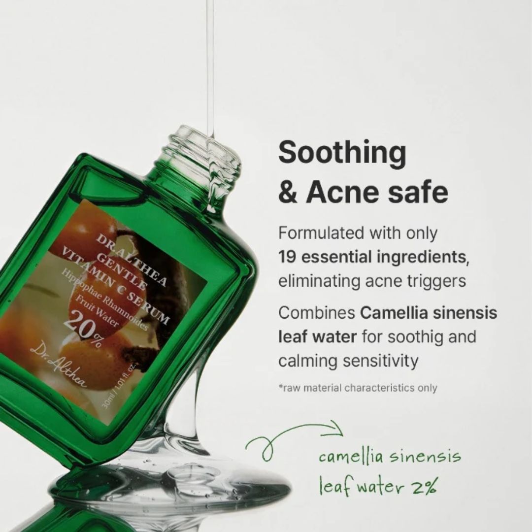 A green glass bottle of Dr. Althea Gentle Vitamin & Serum is shown tilted with liquid dripping from the neck into a pool below.