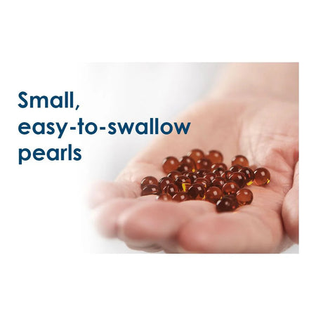 Hand holding small brown pearls with text 'Small, easy-to-swallow pearls' on a white background