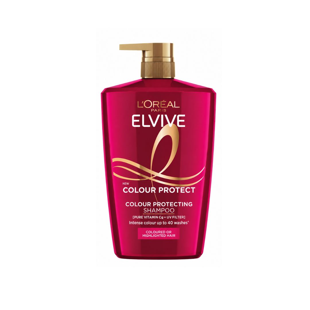 A bottle of L'Oréal Paris Elvive Color Protect Colour Protecting Shampoo in a vibrant magenta-red bottle with a gold pump dispenser, shown on a plain white background.