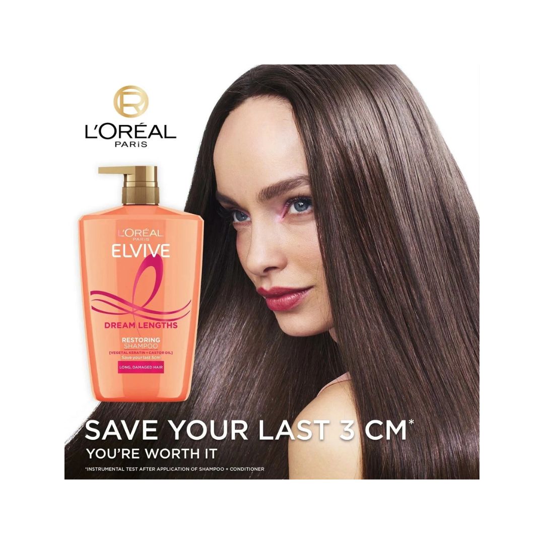L'Oréal Paris Elvive Dream Lengths Restoring Shampoo 1L on a white background with a photo of a brunette hair woman