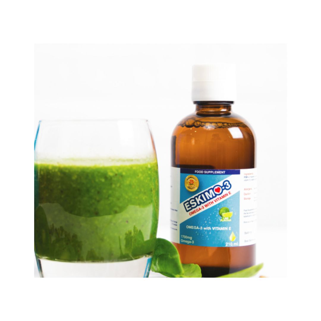 Eskimo-3 Omega-3 with Vitamin E 105ml in a glass and the product bottle behind it
