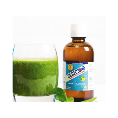 Eskimo-3 Omega-3 with Vitamin E 105ml in a glass and the product bottle behind it