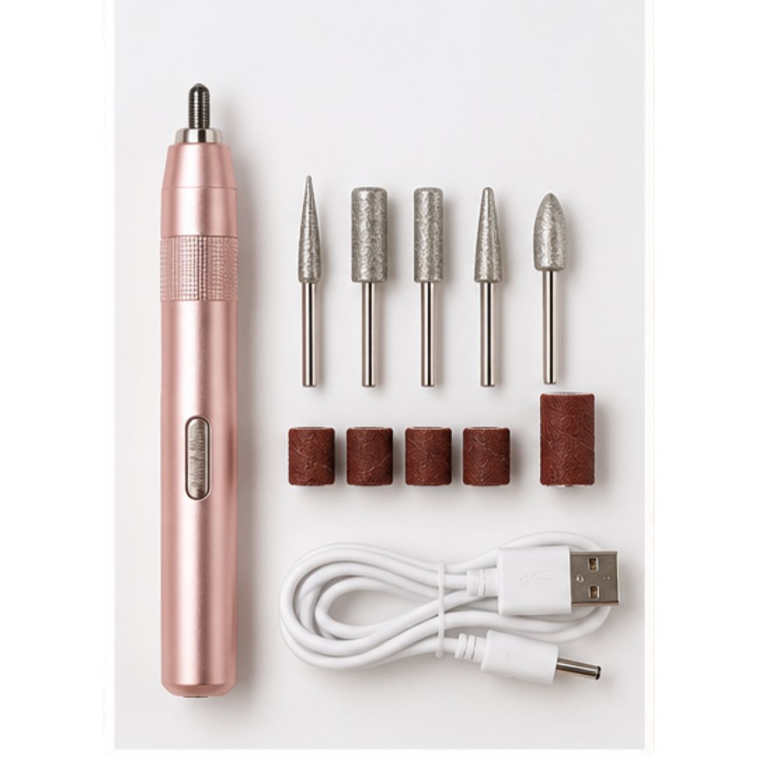 A rose gold electric nail drill with five different metal grinding bits, four brown sanding discs, and a white USB charging cable, arranged neatly on a white background.