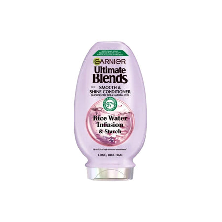 A bottle of Garnier Ultimate Blends Smooth & Shine Conditioner in Rice Water Infusion & Starch, featuring a light purple bottle with a clear cap on a white background.