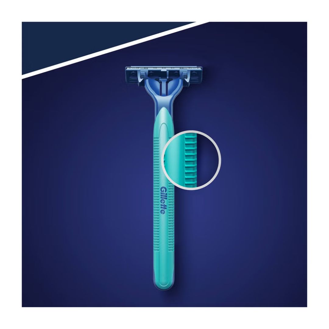 Gillette Blue II Plus Slalom Disposable Razor on a blue angle with a magnification of grip