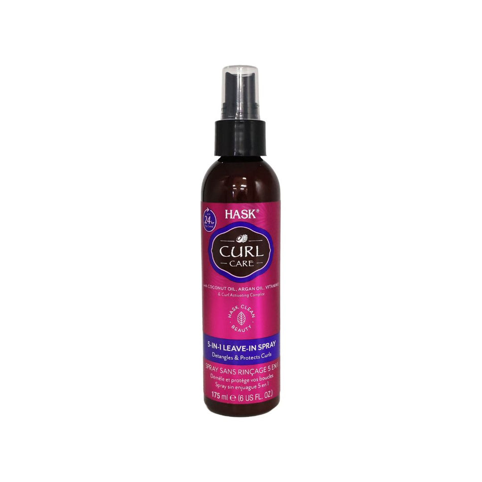 A bottle of Hask Curl Care 5-in-1 Leave-In Spray on a plain white background. The bottle is dark amber brown with a black spray nozzle and a vibrant magenta-pink label featuring the Hask brand logo.