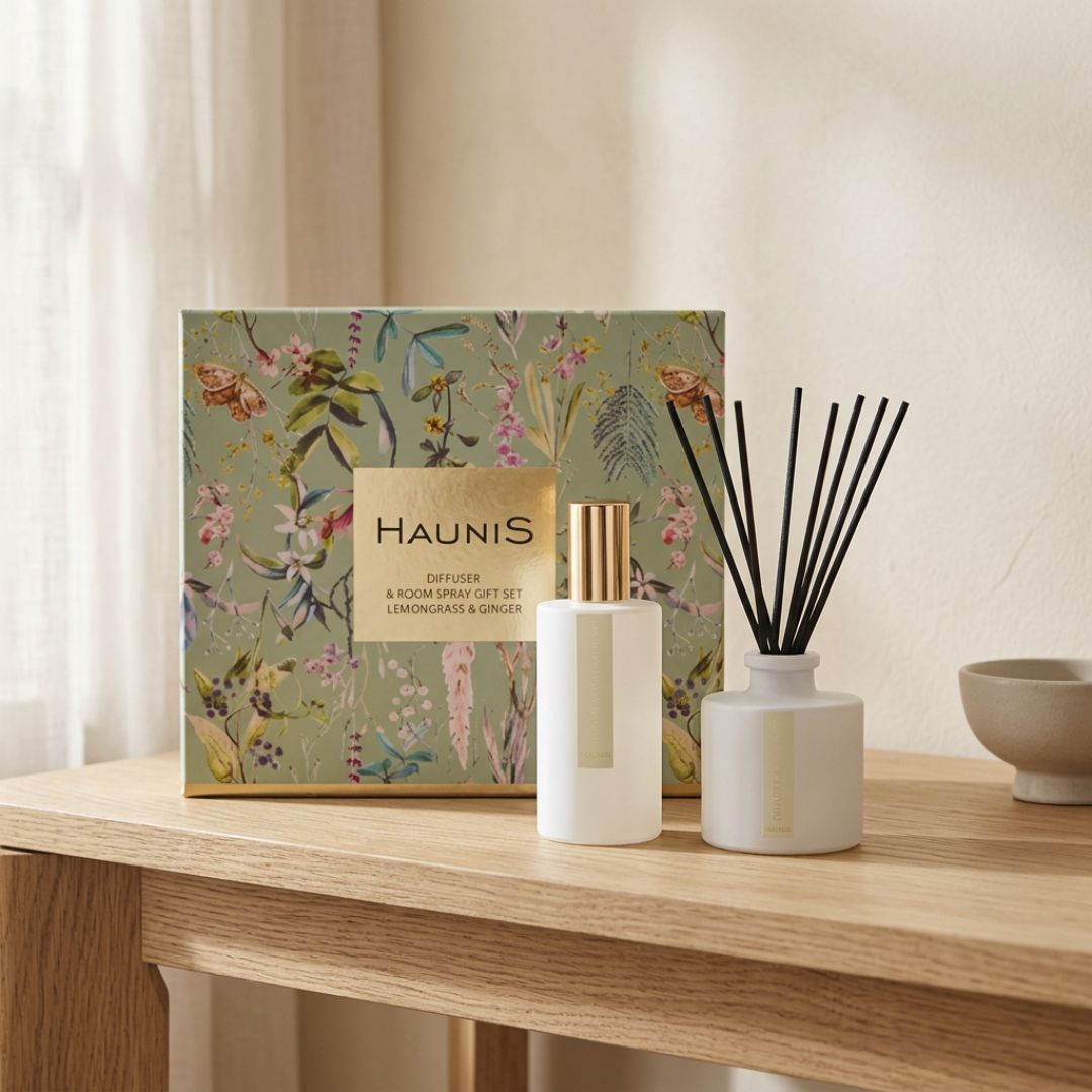 Haunis Lemongrass & Ginger Diffuser & Room Spray Gift Set on a wooden table