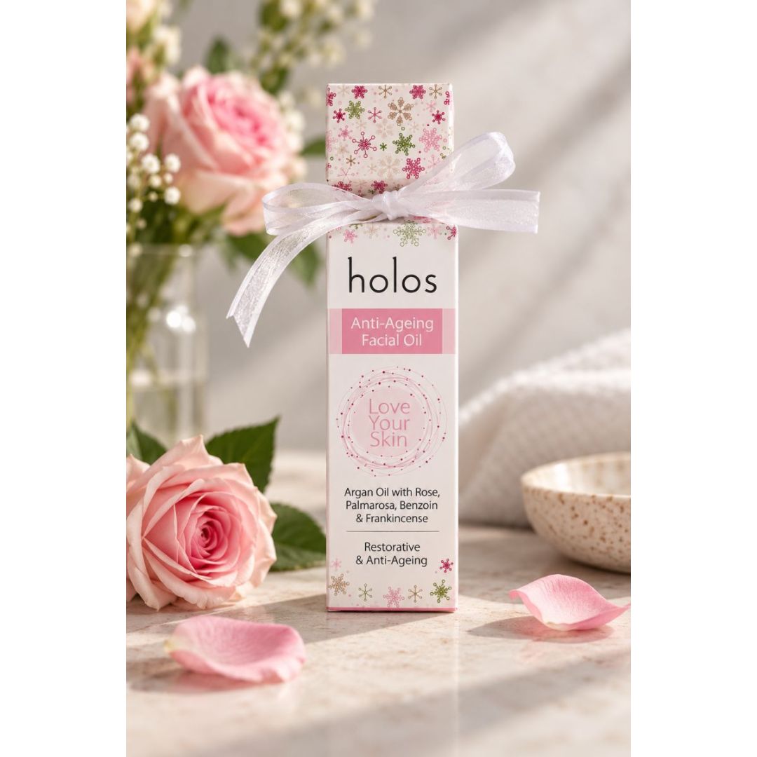 Holos Anti-Ageing Facial Oil Gift Package on a marble countertop