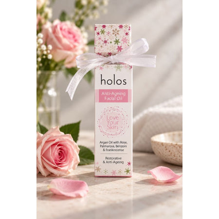 Holos Anti-Ageing Facial Oil Gift Package on a marble countertop