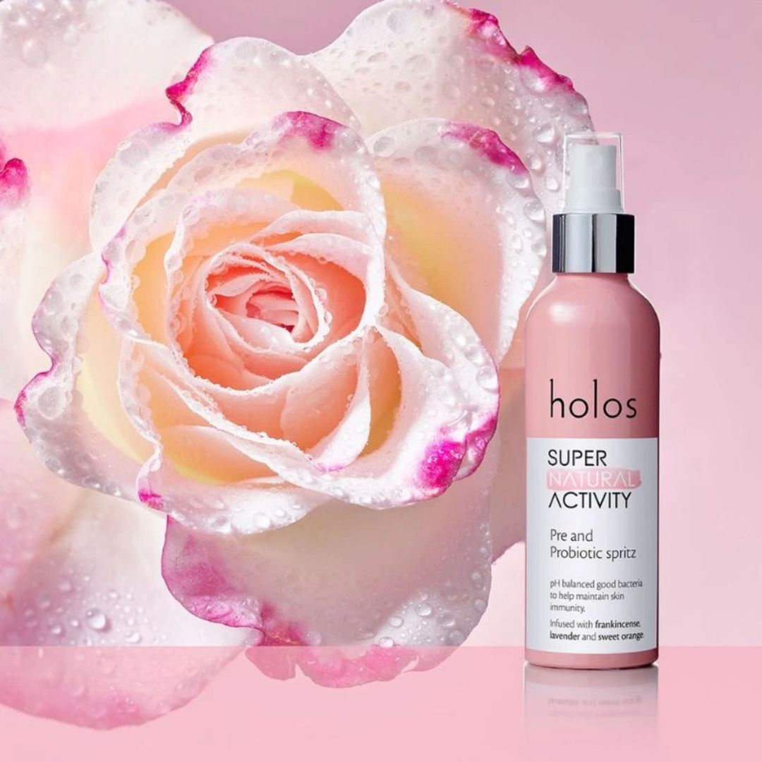 Holos Super Natural Activity Pre & Probiotic Spritz on a floral background