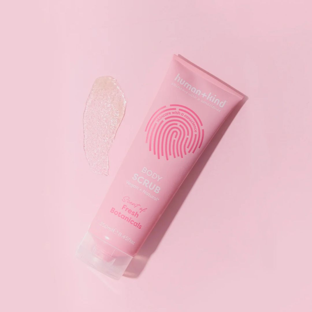 Human+Kind Fresh Botanicals Body Scrub 250ml on a light pink background