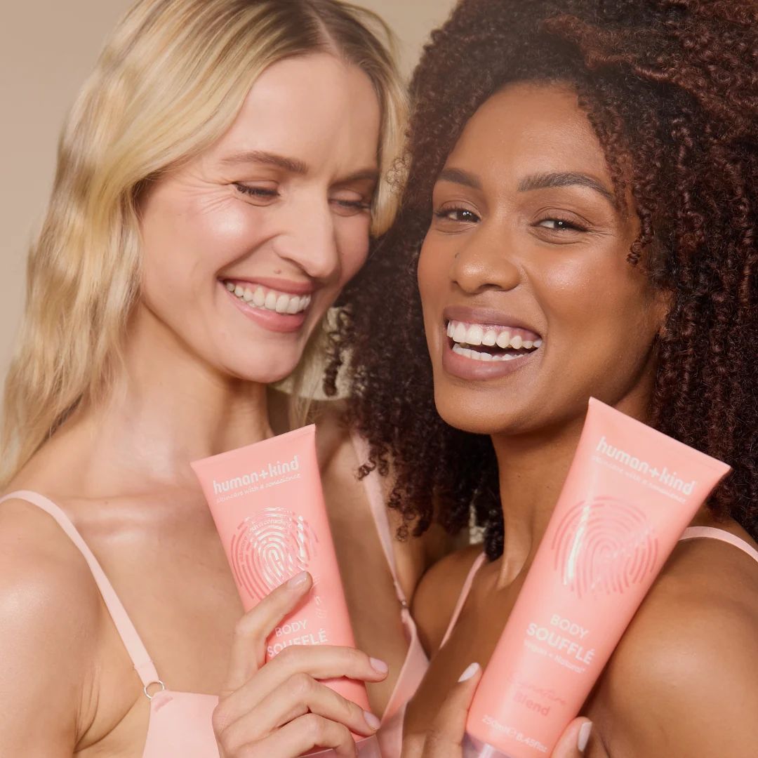 Human+Kind Signature Blend Body Soufflé being held up by two smiling women