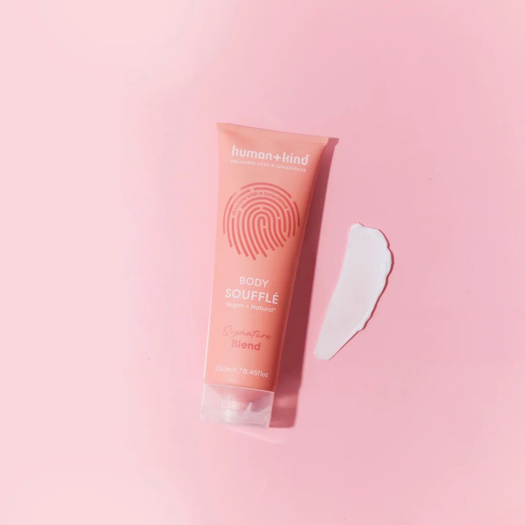 Human+Kind Signature Blend Body Soufflé on a pink background