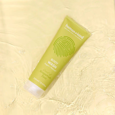 Human+Kind Grapefruit Zest Body Wash 250ml on a light green background
