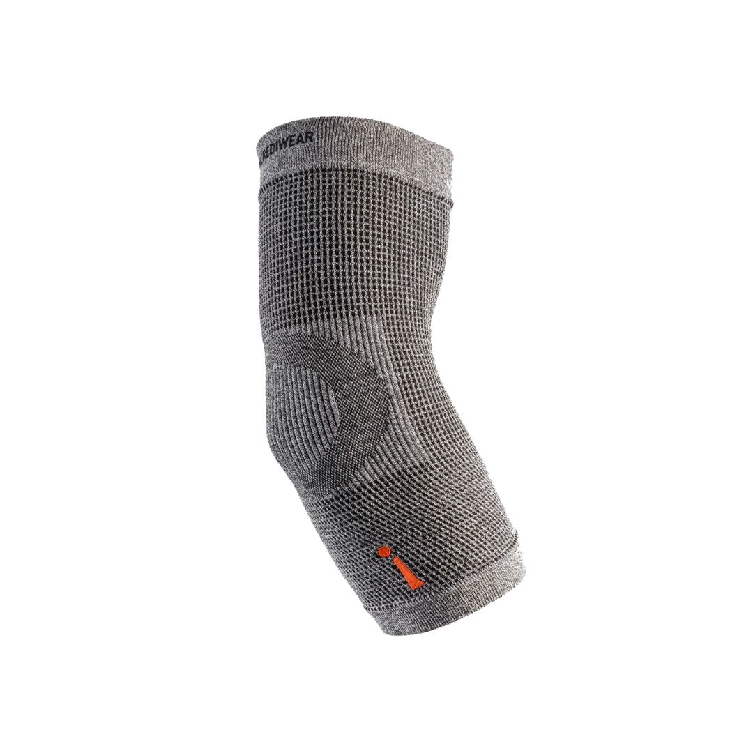 A gray knit knee support brace with a textured grid pattern, featuring a darker gray compression zone on the inner side and a small orange logo near the bottom cuff. The brand name 'INCREDIWEAR' is visible at the top collar.