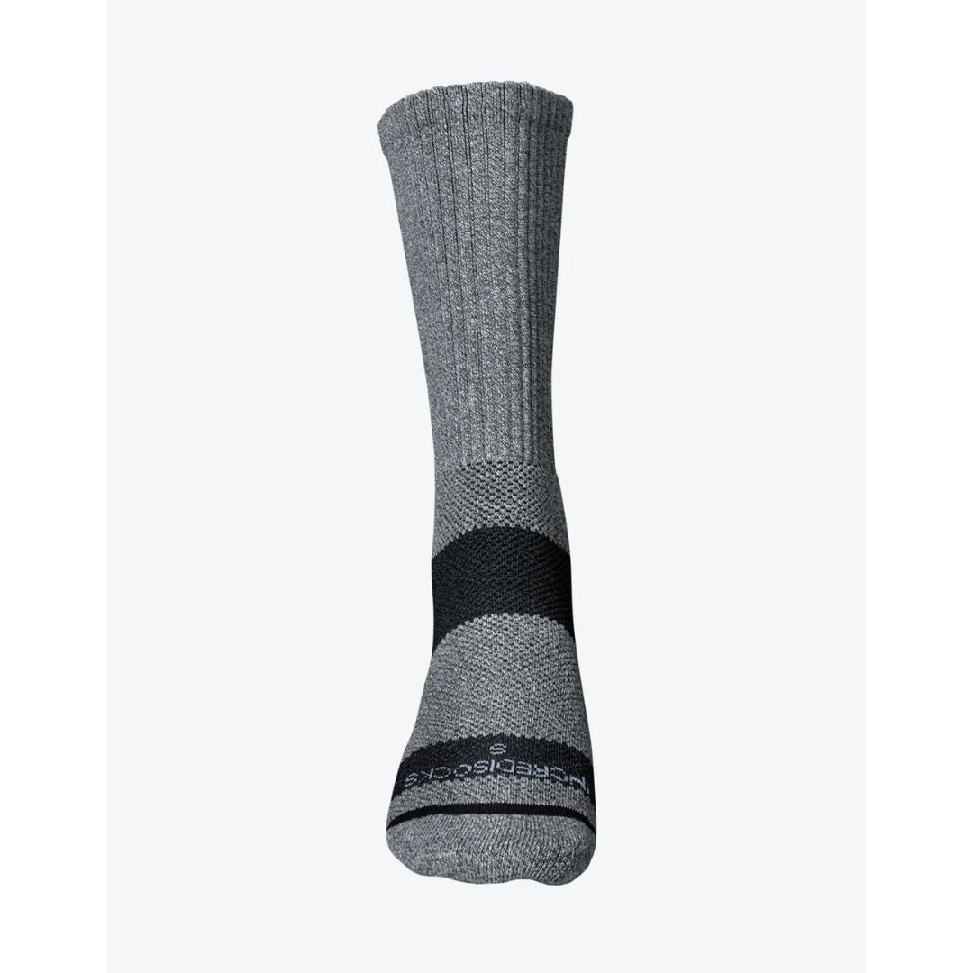 A single crew sock shown from the side against a plain white background. The sock features a ribbed gray upper, a black midfoot support band, and a gray toe with a black brand stripe