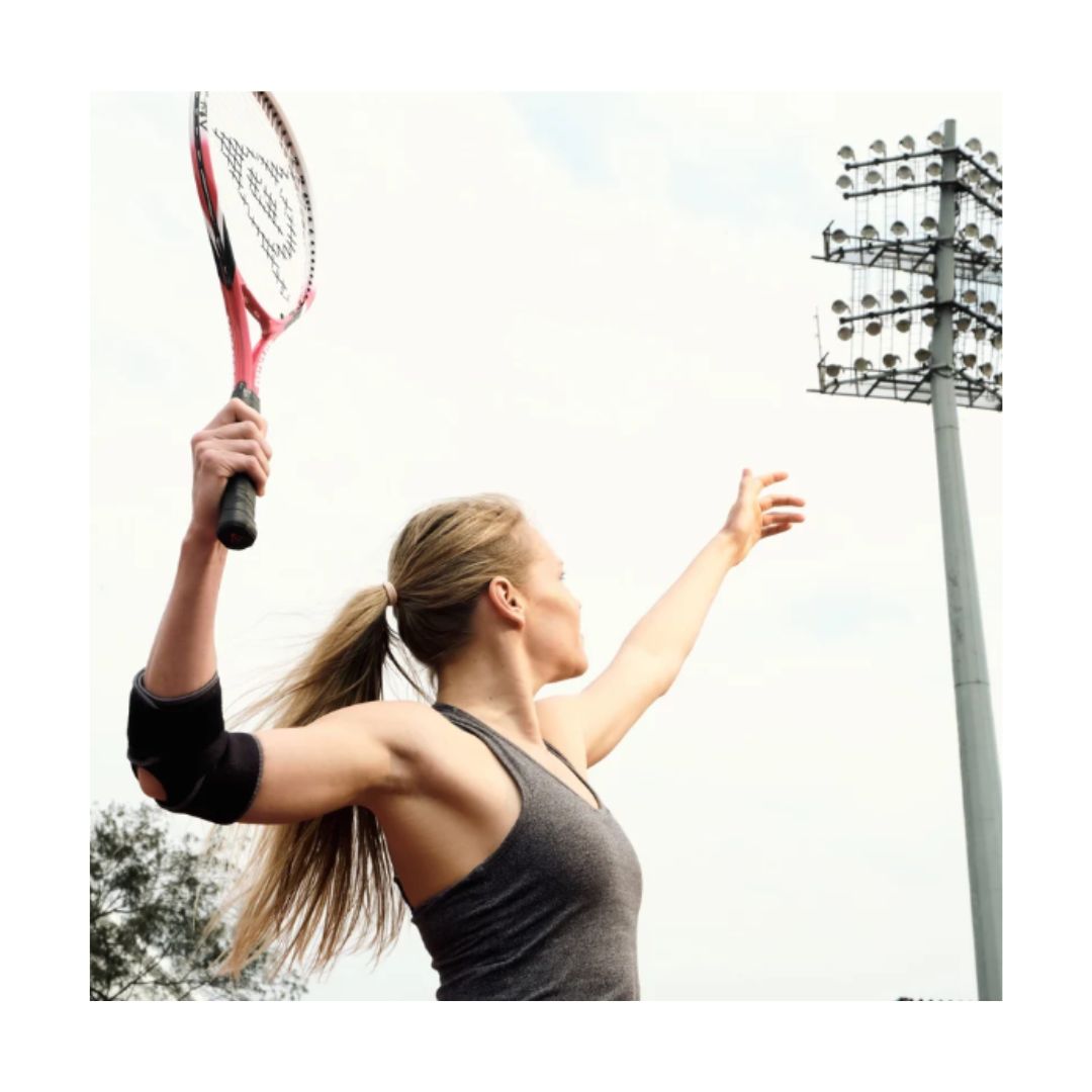 Kedley Advanced Elbow Support on woman playing tennis