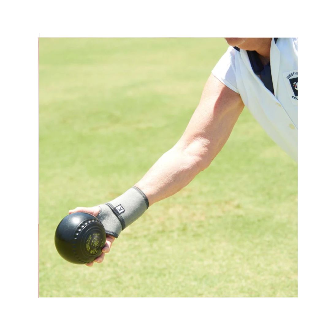 Kedley neoprene wrist support in use while playing sports
