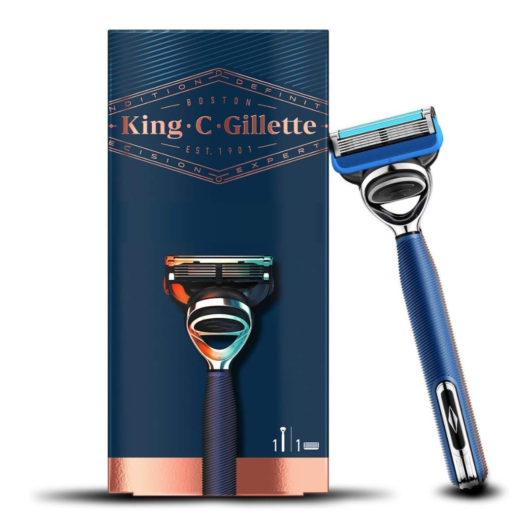 A King C Gillette razor with a blue handle and blue multi-layer head stands next to its dark blue retail box on a white background.