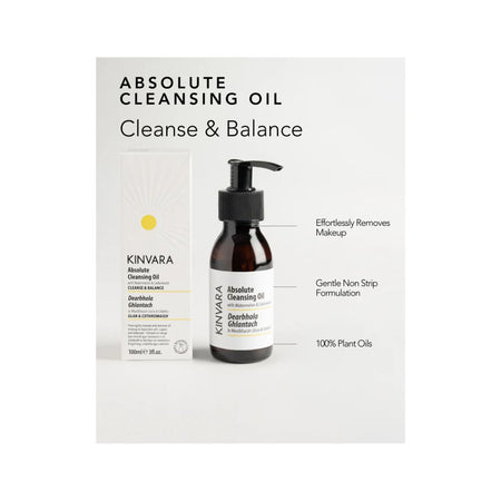 Kinvara Absolute Cleansing Oil in the 'Cleanse & Balance' variant, shown with its white and yellow packaging box and a dark amber pump bottle on a light gray background with descriptive text callouts.